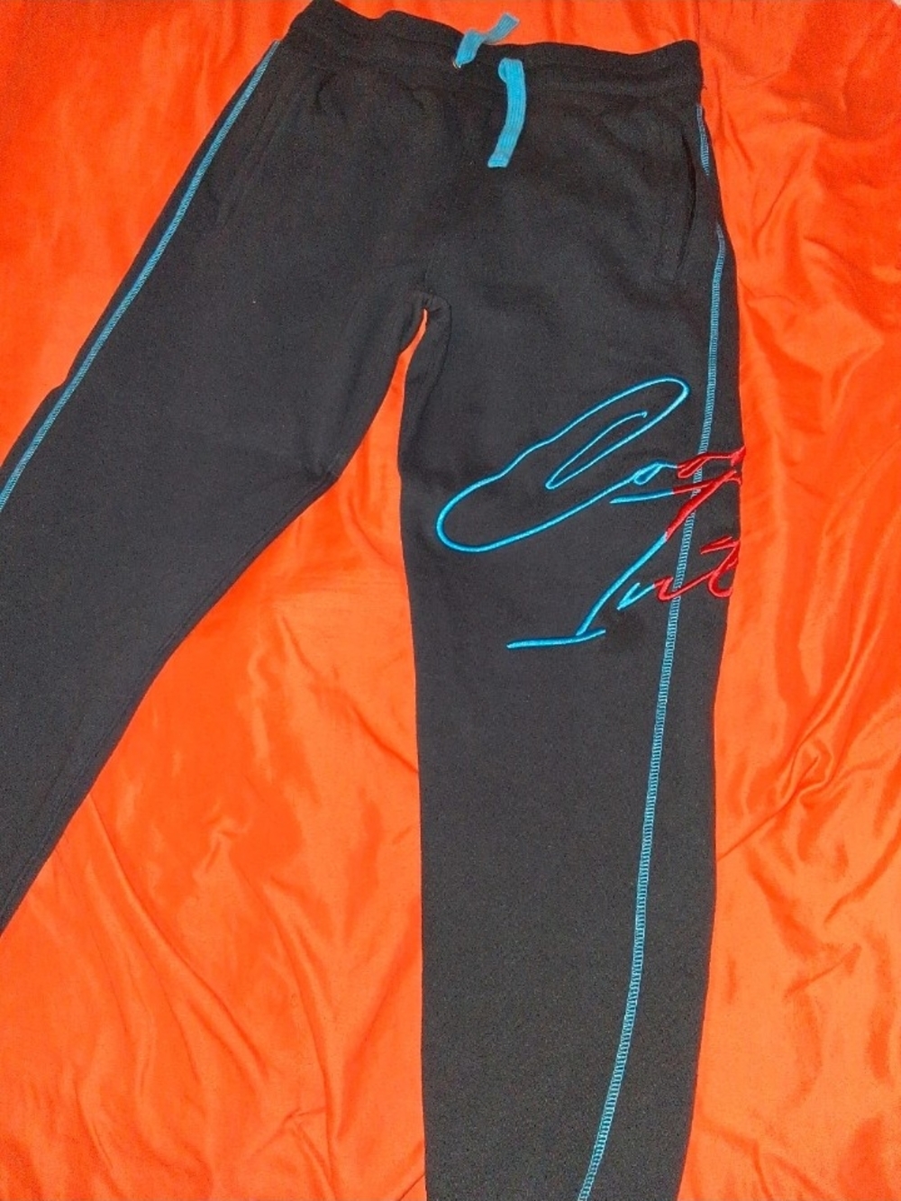 Men's Black Joggers with Teal Stitching and Red Script